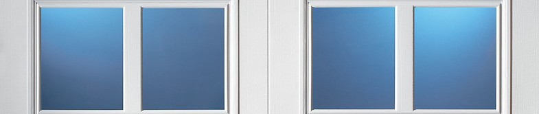 White garage door windows with a 2-pane vertical grid and blue-tinted glass.