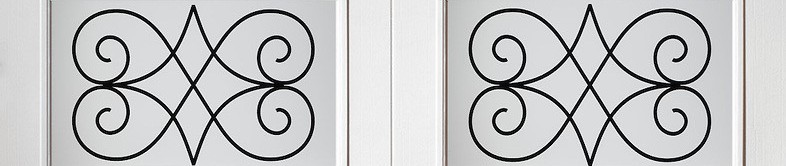 White garage door windows with decorative black scrollwork inserts and clear glass.